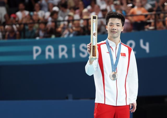 7m体育-从东京的替补到巴黎摘铜 严浪宇有遗憾也有收获